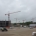 Quiet UK construction site with cranes and workers