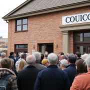 Burnley Council building with residents protesting development.