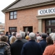 Burnley Council building with residents protesting development.