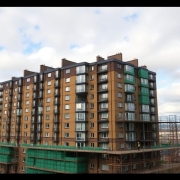 Edinburgh Banana Flats with scaffolding and green construction activity