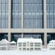 London Stock Exchange building with three architectural models.