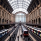 Liverpool Street Station concourse with trains and passengers.